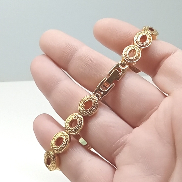 Jules Jurgenson gold toned, with green stones, linked watch. Size: 7 - Picture 5 of 7